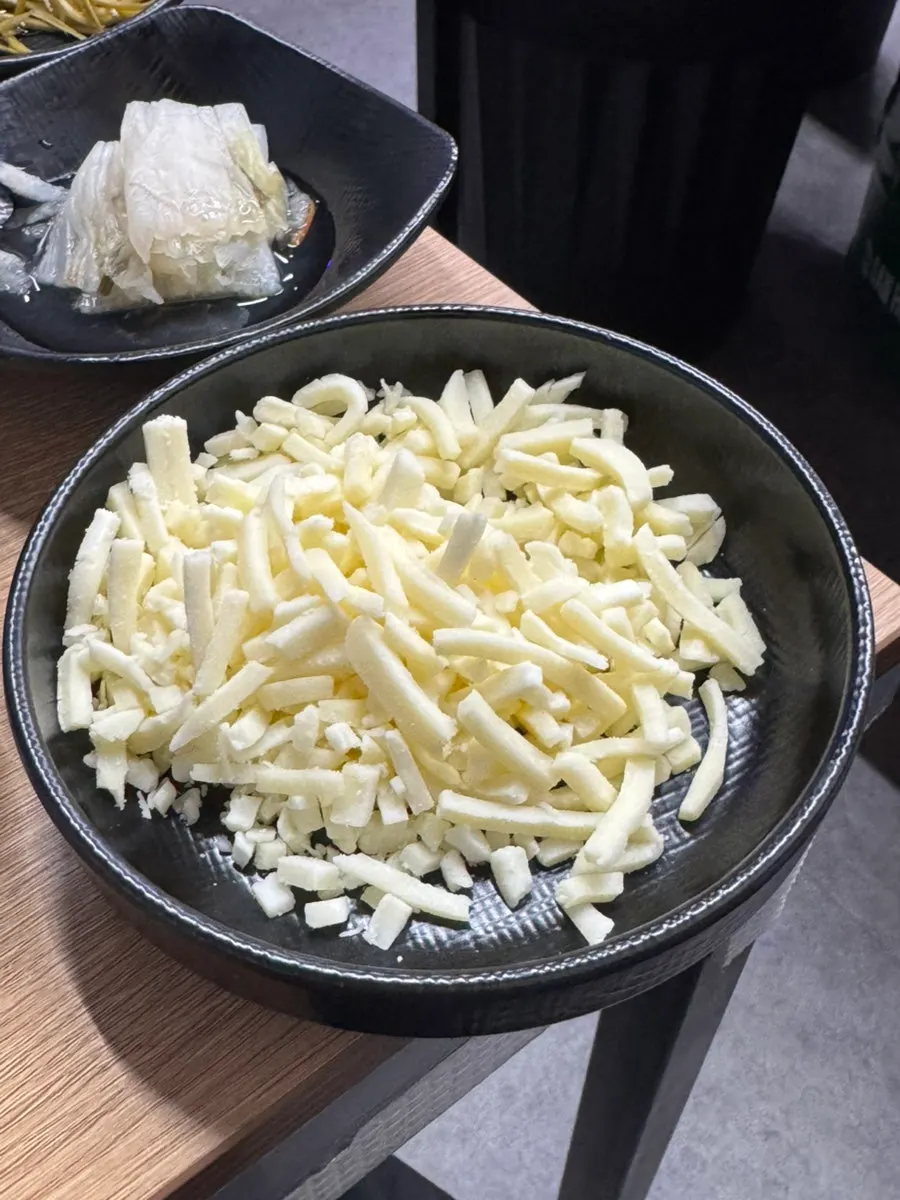 Cauldron fried rice being stir-fried in the pot