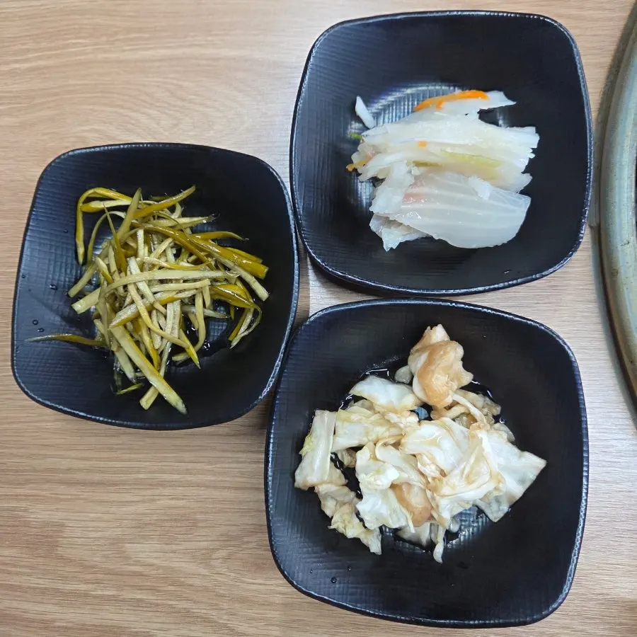 A full spread of basic side dishes on the table