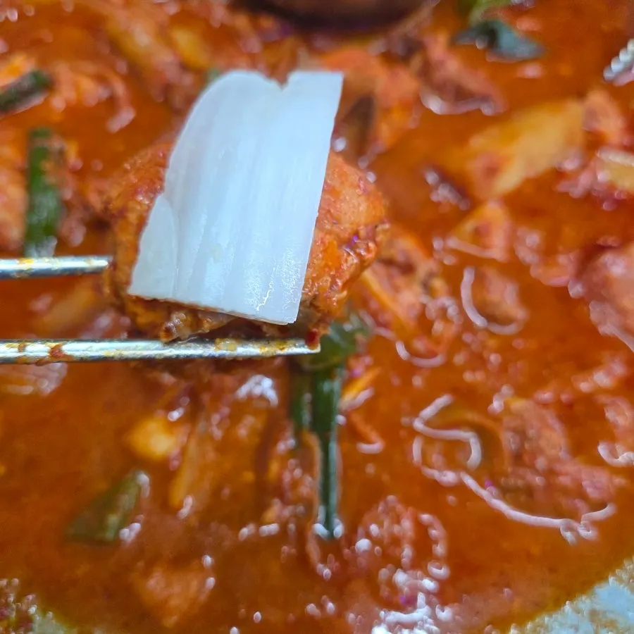 Cast-iron chicken stew with only broth remaining