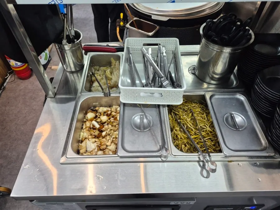 Self-serve bar at Sindaebakjip for topping up basic side dishes
