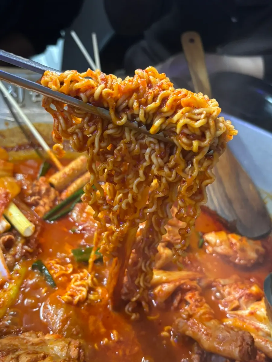 Aged kimchi cast-iron chicken stew simmering