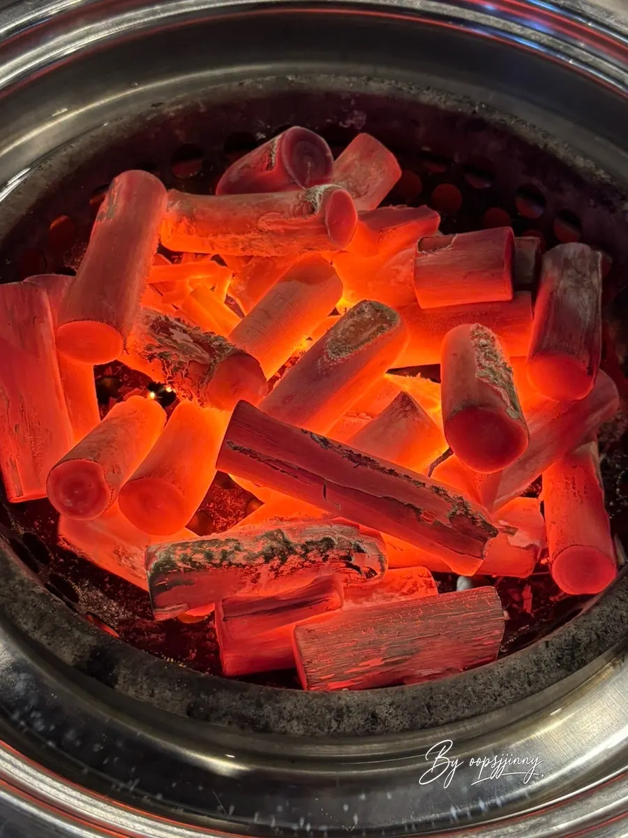 Charcoal added to the grill