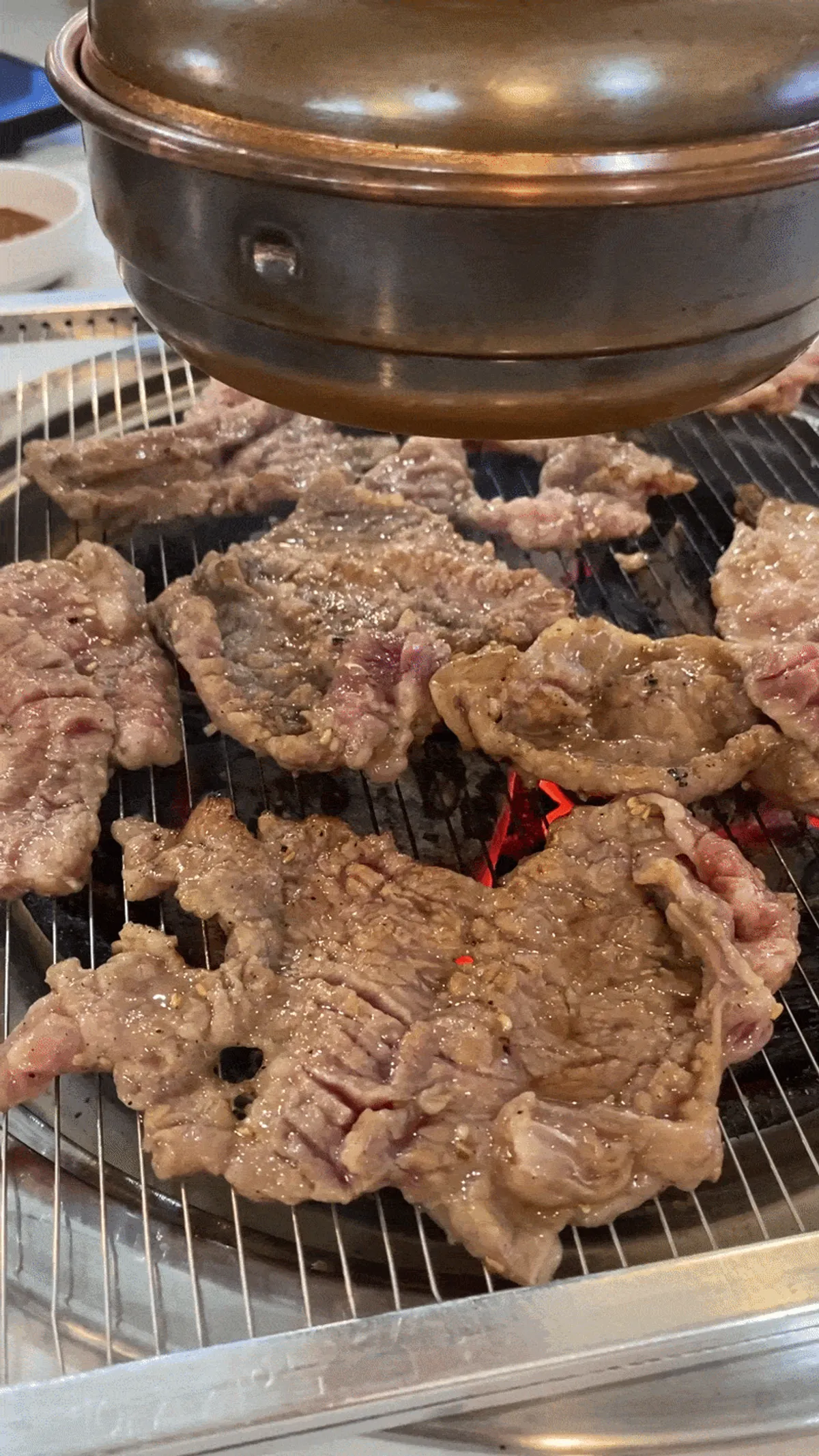 Seoseo galbi grilling over the charcoal