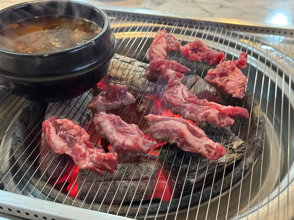 Galbi on the charcoal grill with the free doenjang stew
