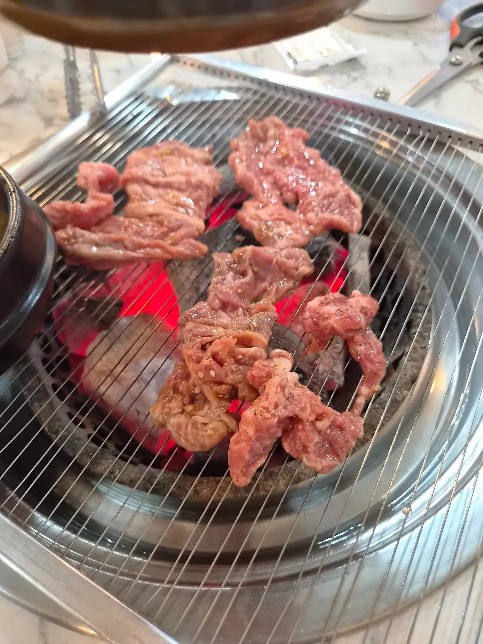 Seoseo Galbi on a charcoal grill