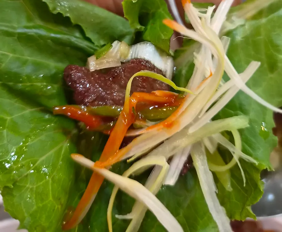 Marinated ribs eaten with a child