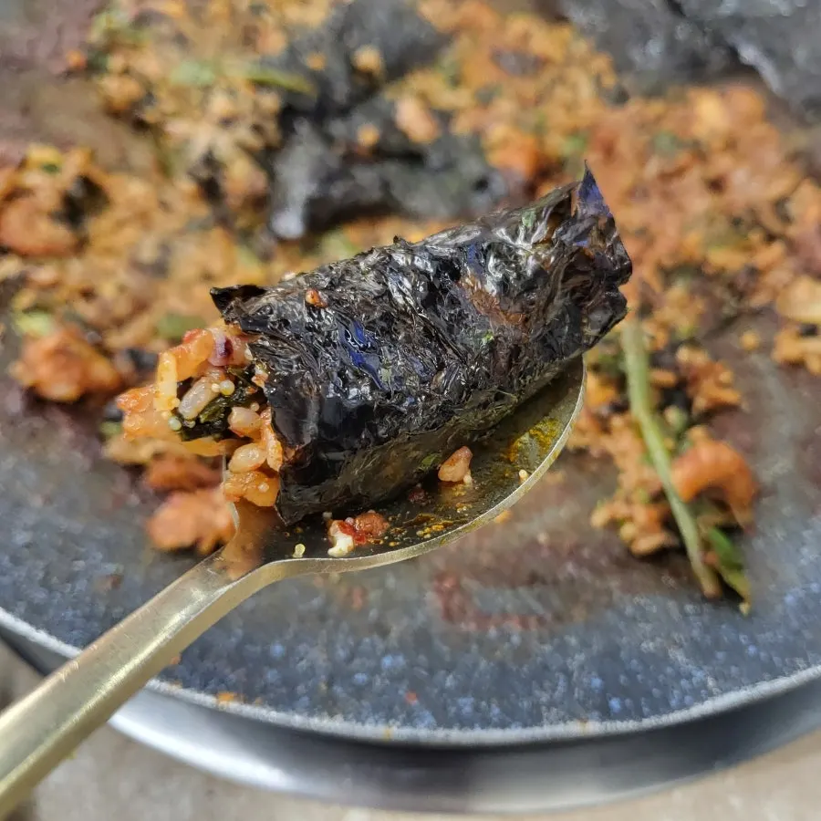Flying fish roe fried rice pressed flat on the griddle