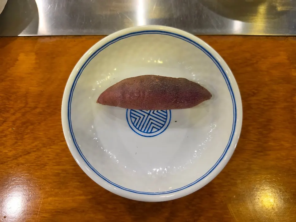 A piece of oven-roasted sweet potato