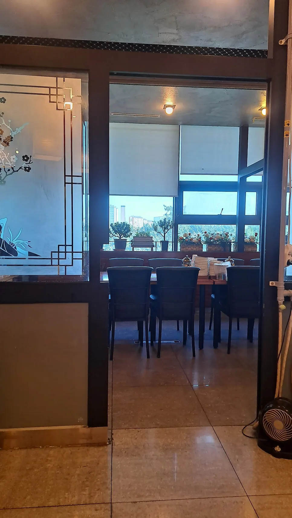 Spacious hall table seating at Todam Hwadok Saengseongui
