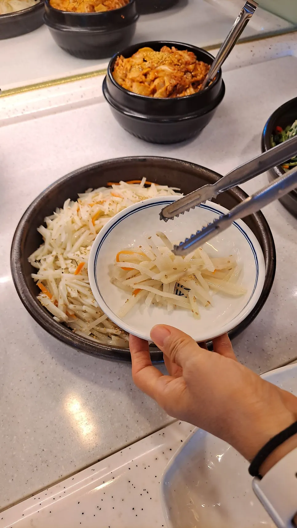 Plate of mildly seasoned basic side dishes