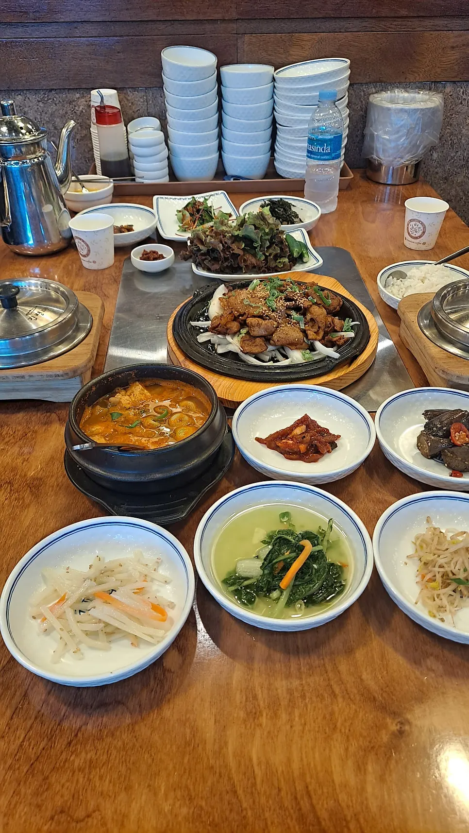Charcoal pork meal served with fresh wrap vegetables