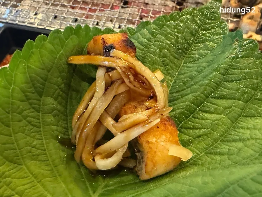 Par-grilled eel arranged on the grill