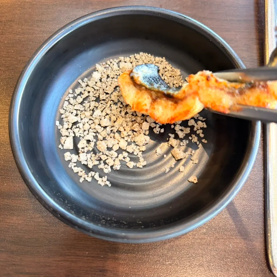 Fat sizzling off eel on the charcoal grill