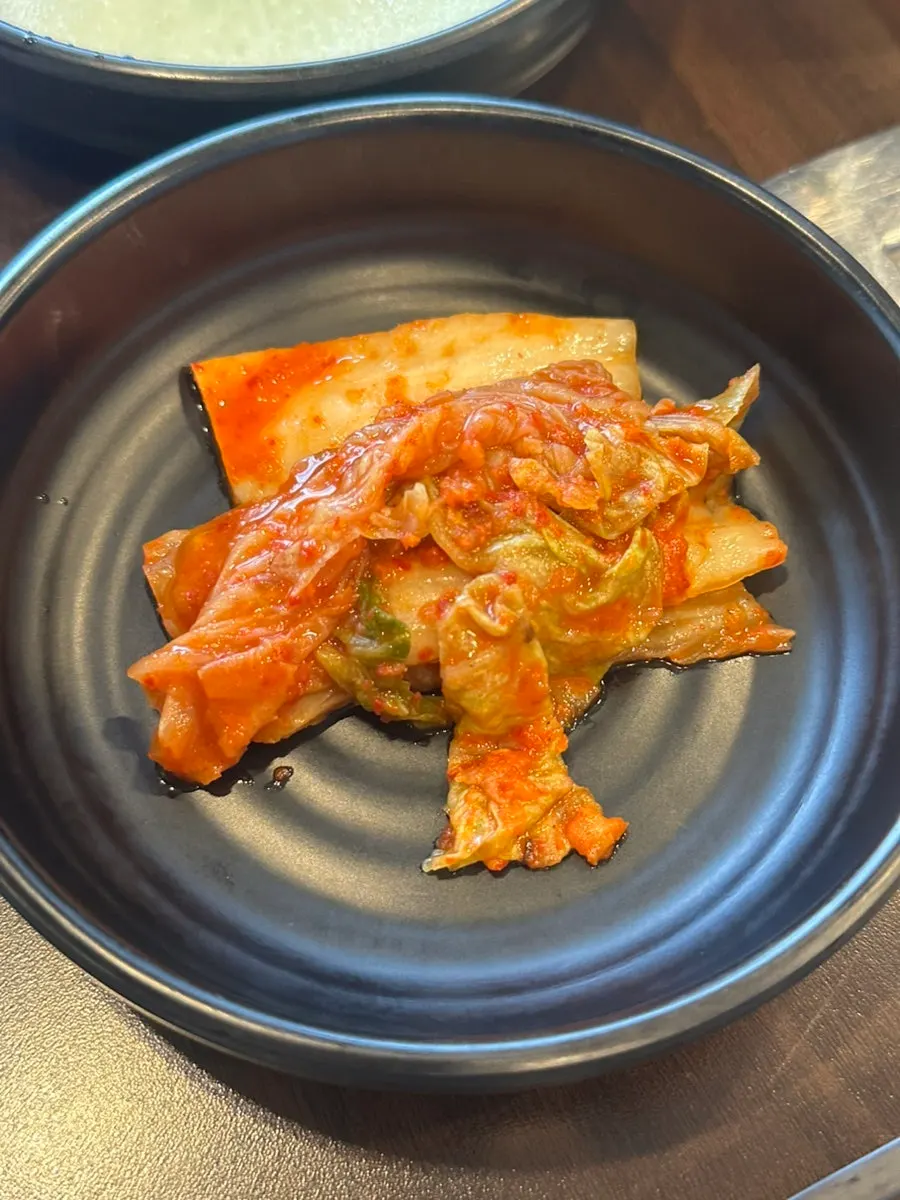 Plates of basic side dishes at Yuil Jangeo