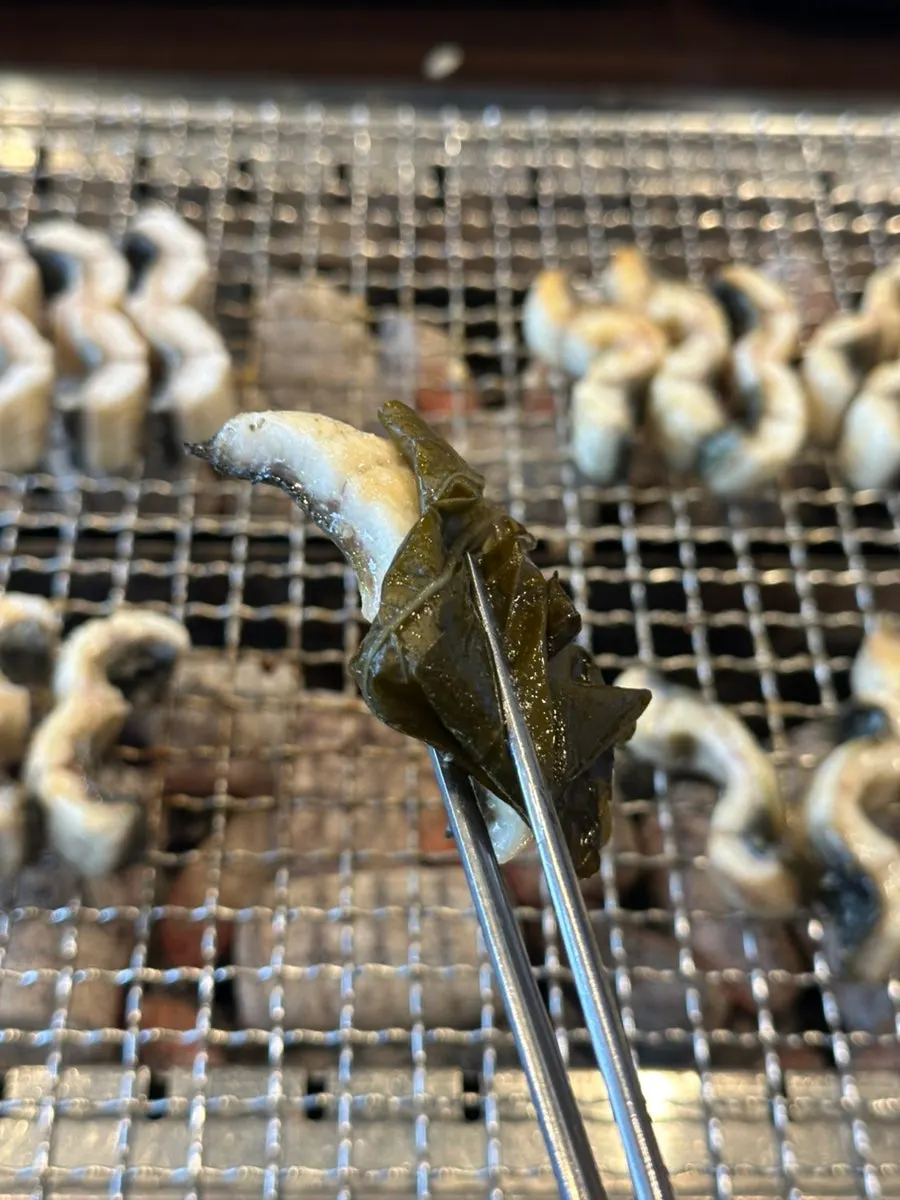 Eel wrapped with ginger and accompaniments