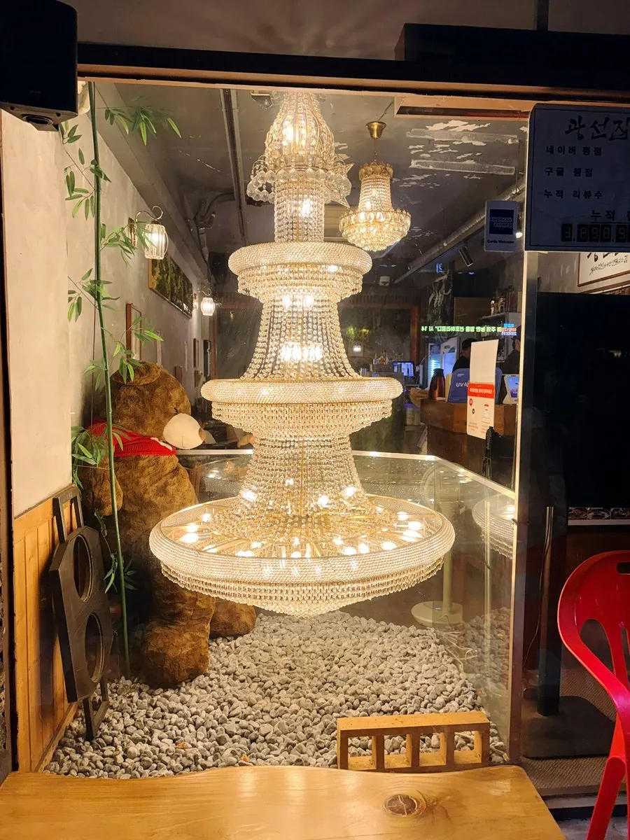 Interior of Gwangseonjip lit with chandelier lighting