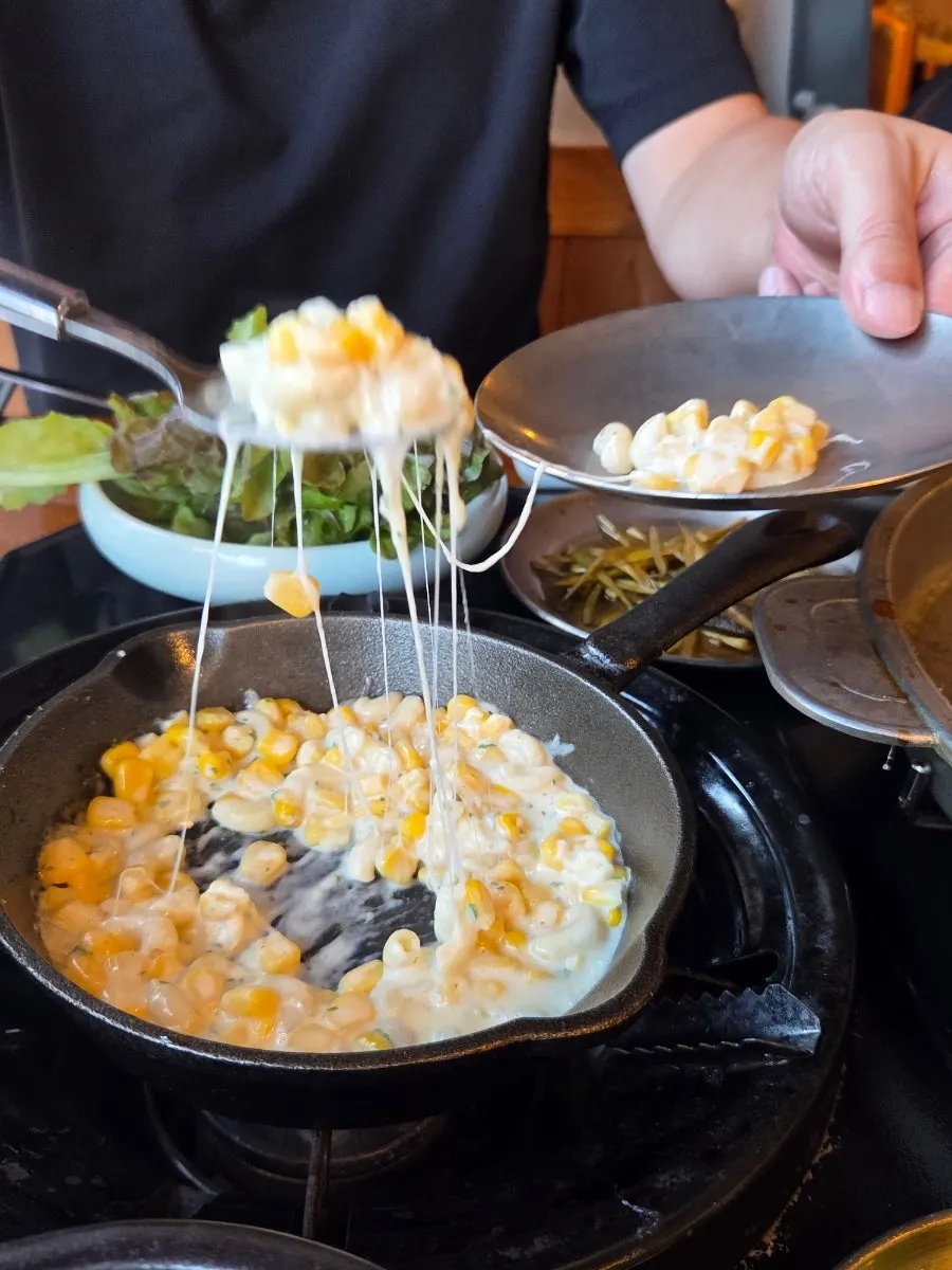 Corn cheese with stretchy melted cheese
