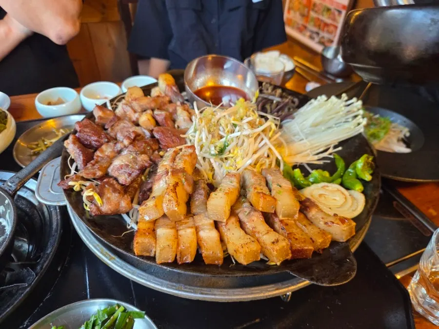 Mixed platter with kkodeulsal, ppolsal, and Jeju samgyeopsal