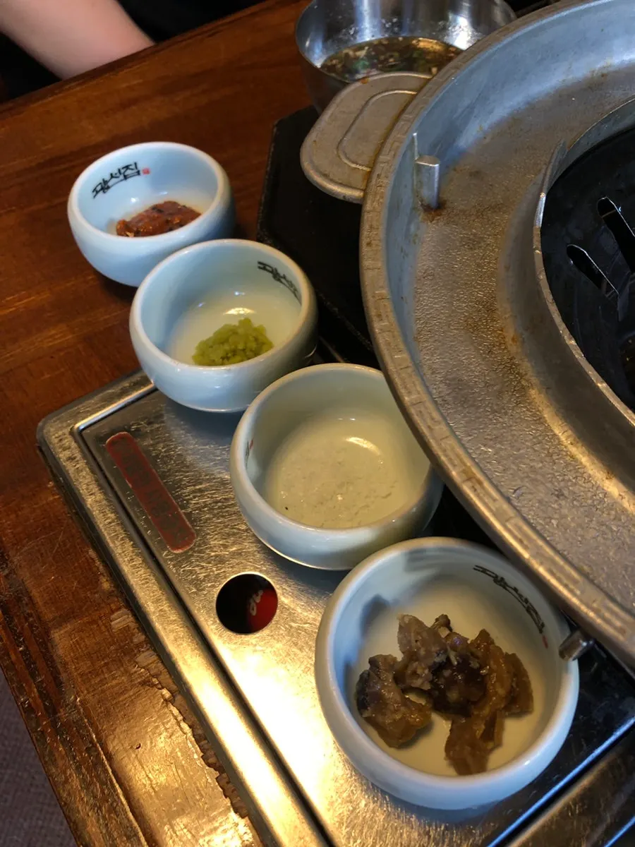Table setting with basic side dishes at Gwangseonjip