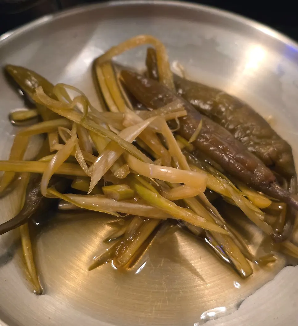 Pickled hot pepper and onion served salad-style