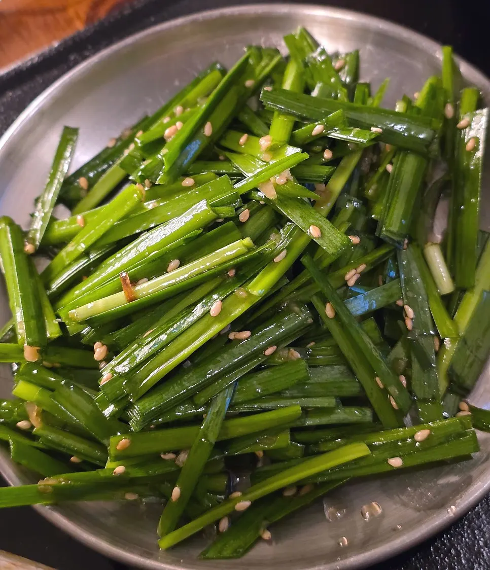 Jeju black pork mixed half platter on the grill