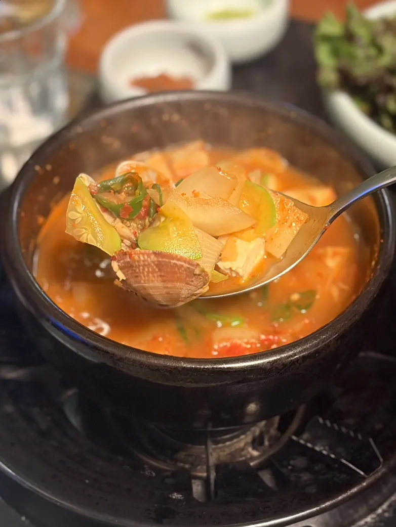 Spicy clam doenjang stew loaded with ingredients