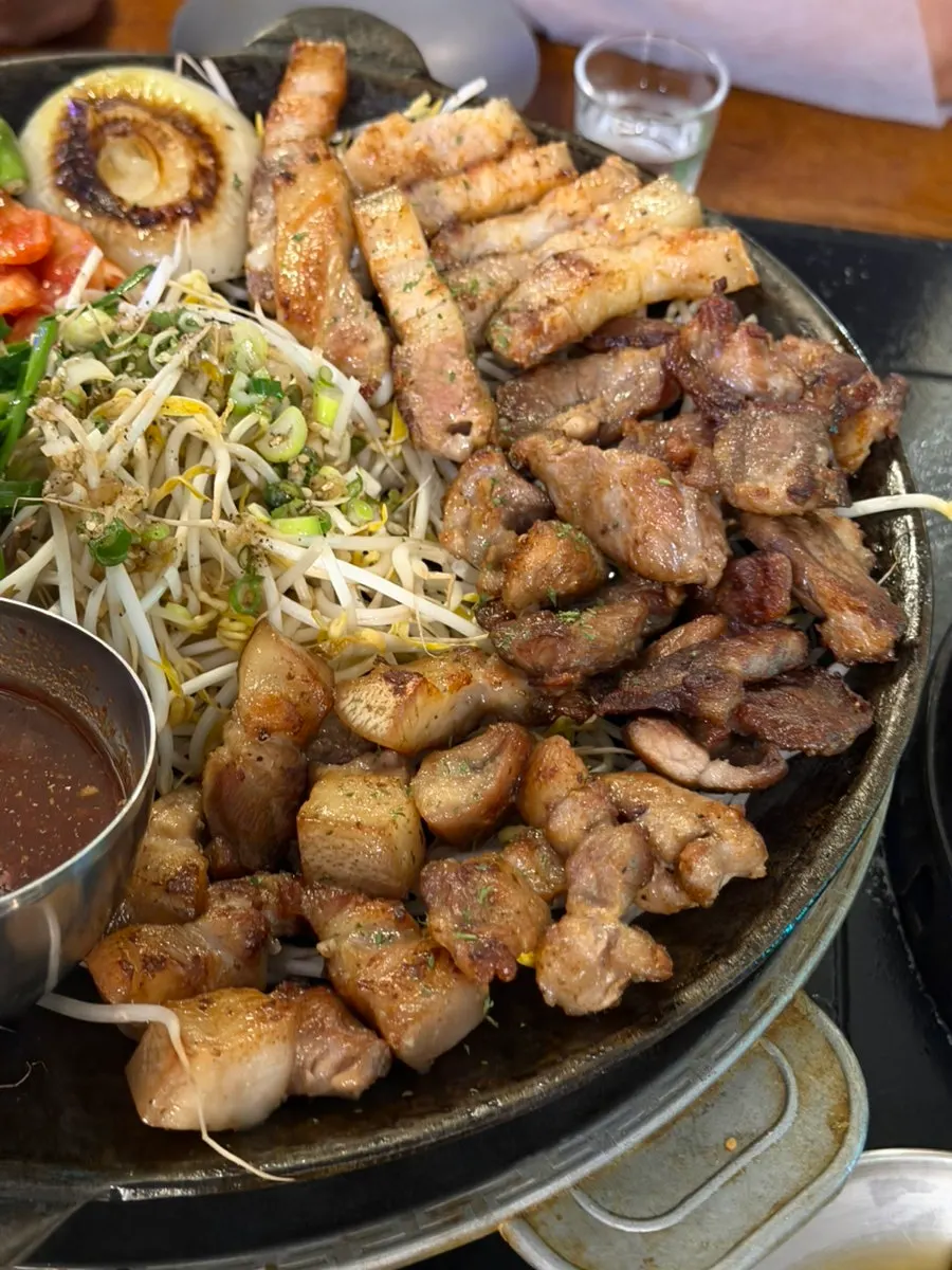 Grilled meat and vegetables on the brazier
