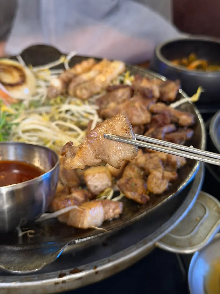 Meat wrapped and eaten with side vegetables