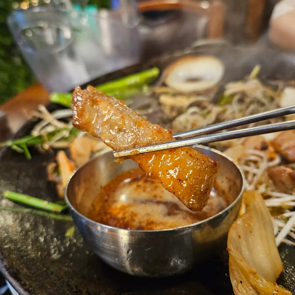 Grilled vegetables served alongside the meat