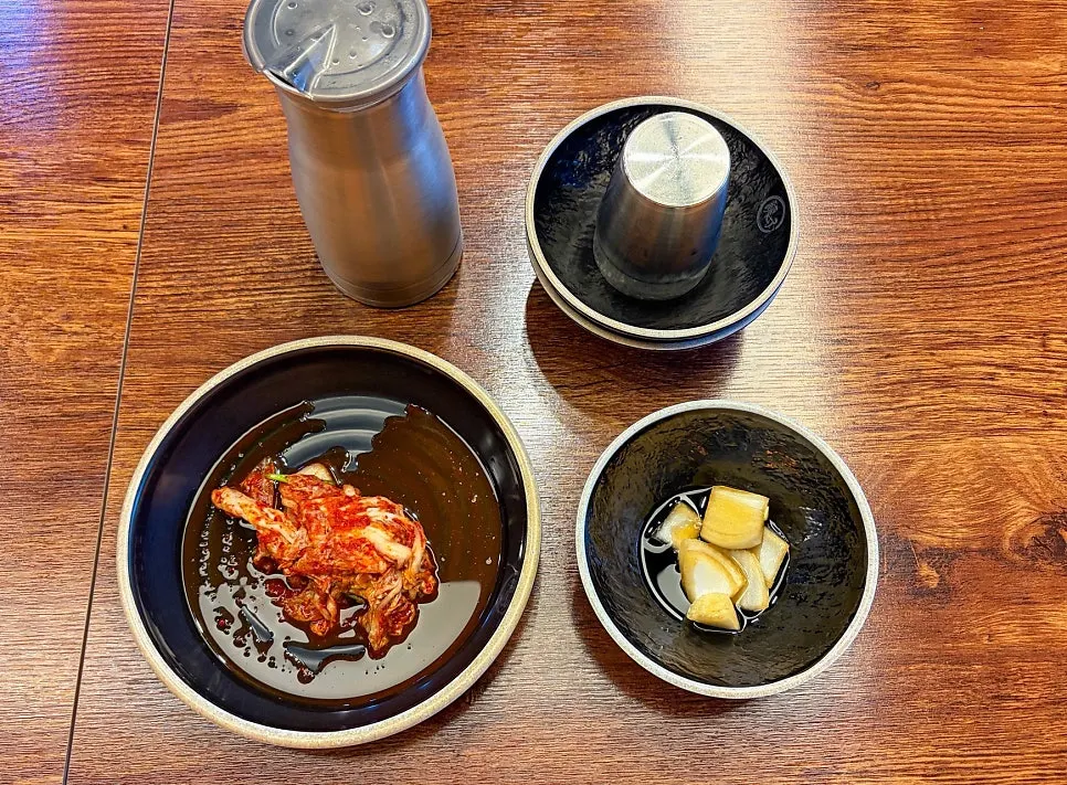 Table spread of ordered kalguksu and steamed dumplings
