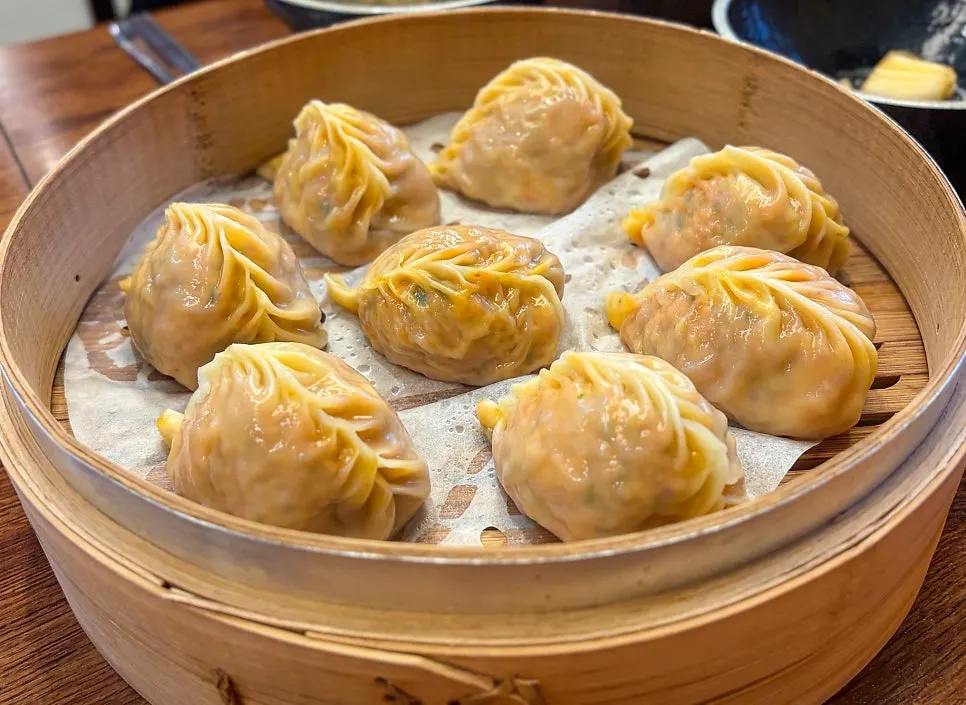 A plate of Yongja 1 kimchi steamed dumplings