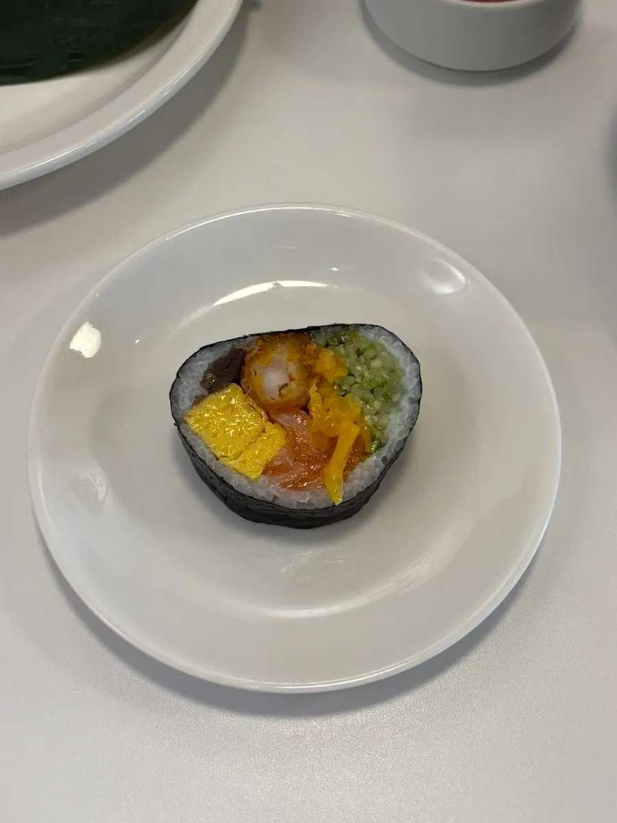 Five pieces of aged salmon futomaki
