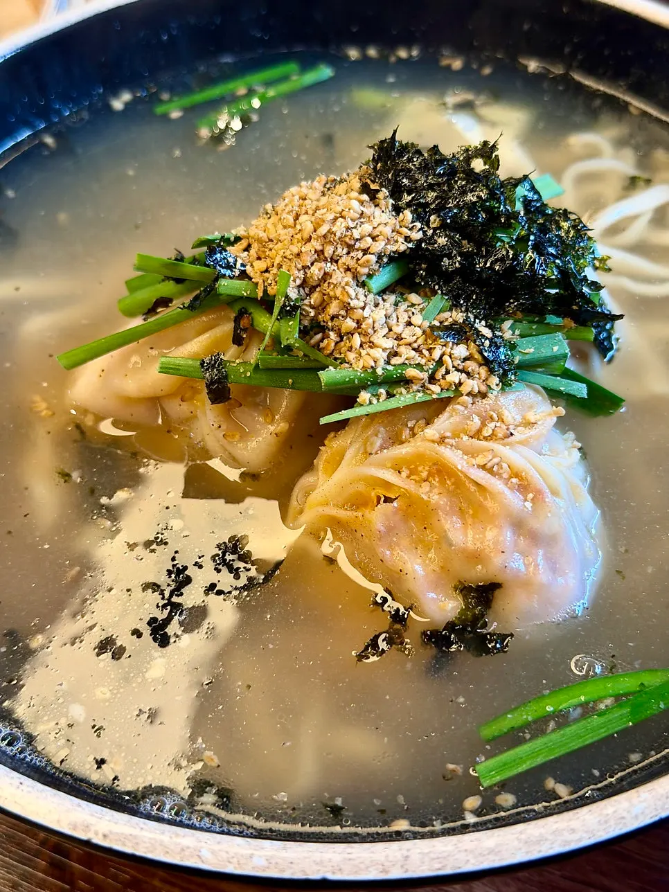 The rich, clean broth of the dumpling kalguksu soup