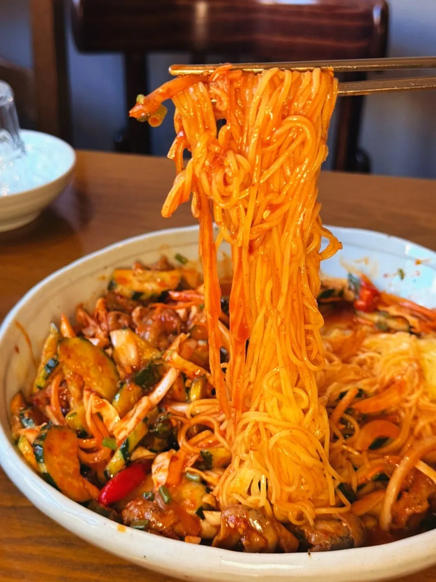 Whelk and vegetables tossed in spicy-sweet sauce