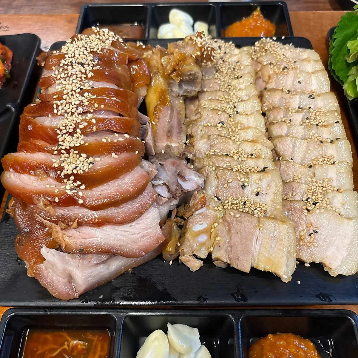 Full table spread of jokbal and bossam at Gwihan Jokbal Nowon Branch