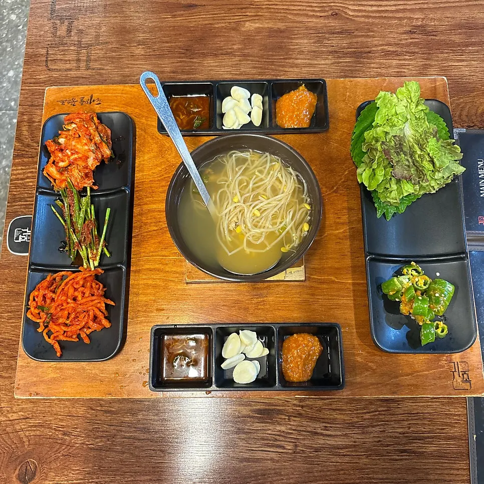 Ssamjang and garlic with salted shrimp placed for each diner