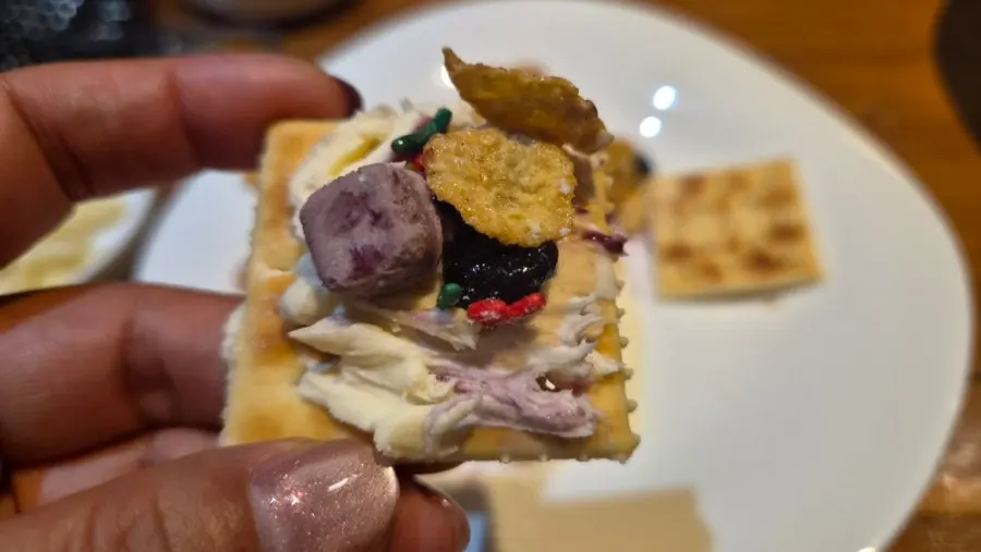 Homemade cream cheese and blueberry compote canapé on biscuits