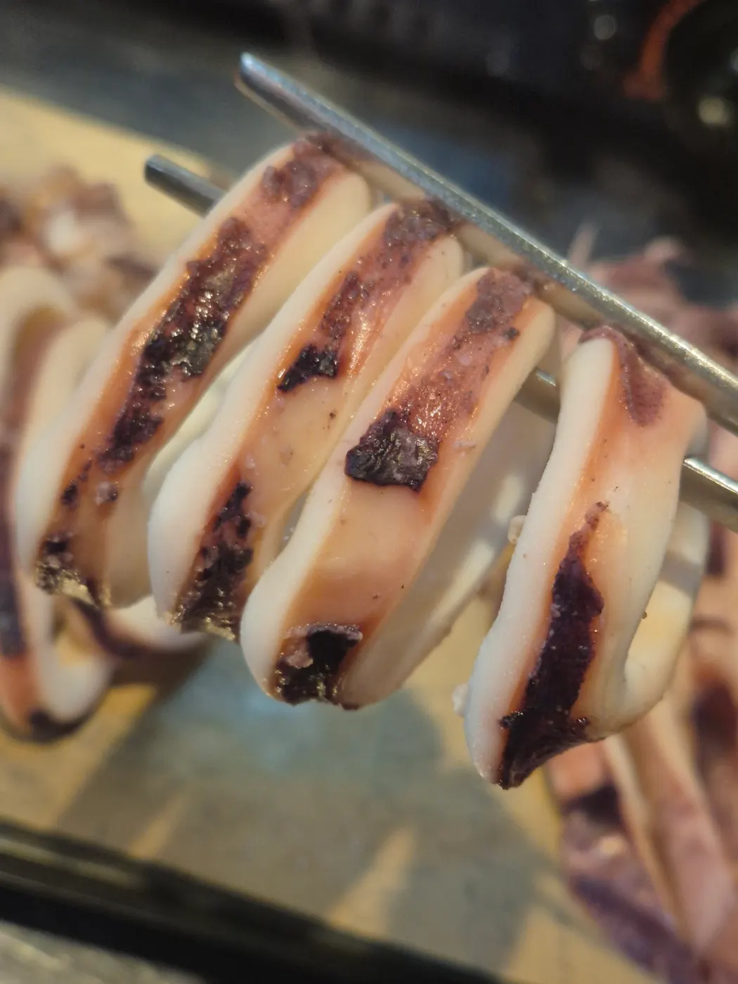 Close-up of the moist boiled squid