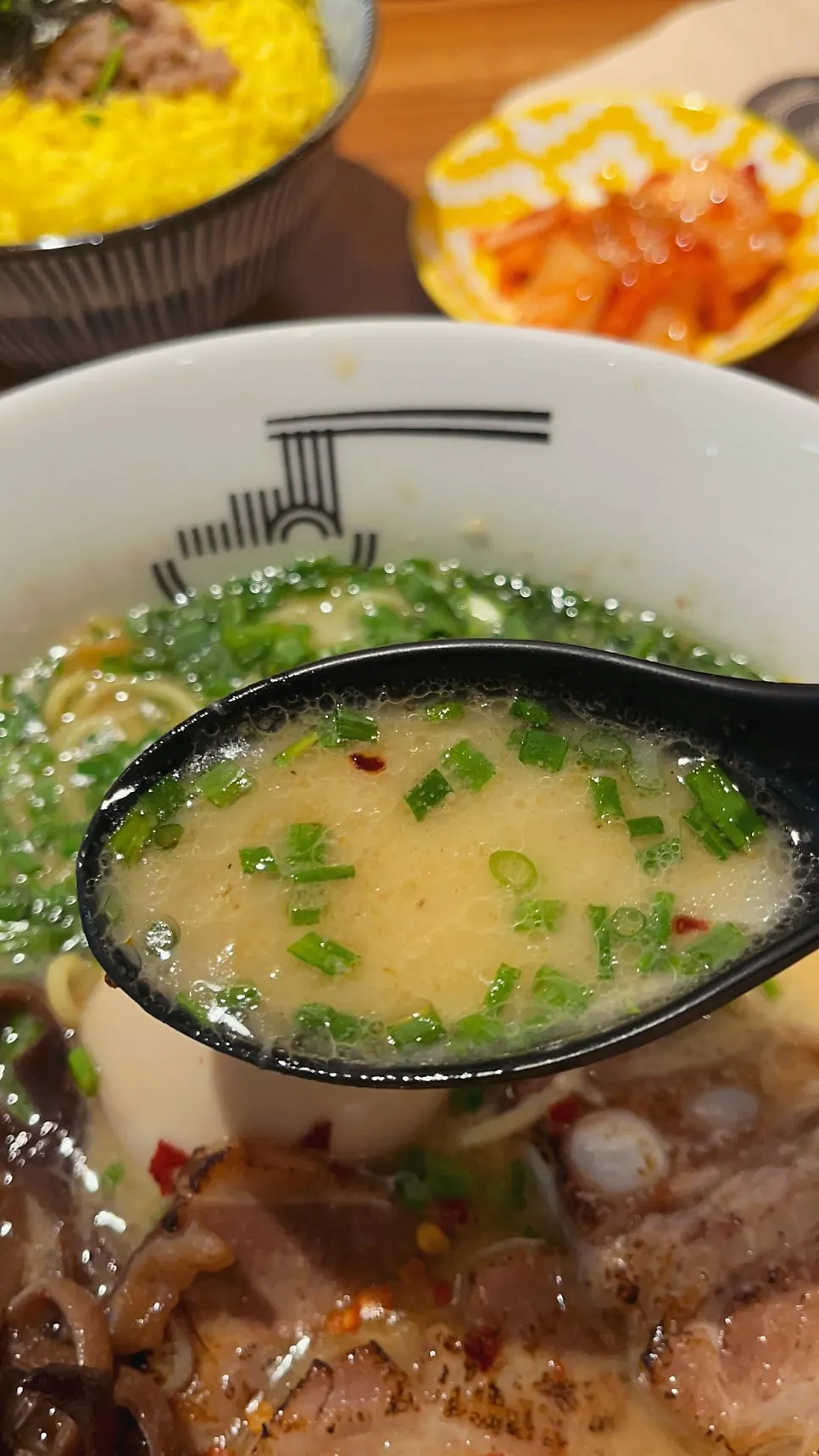 Ramen broth with spicy secret sauce added