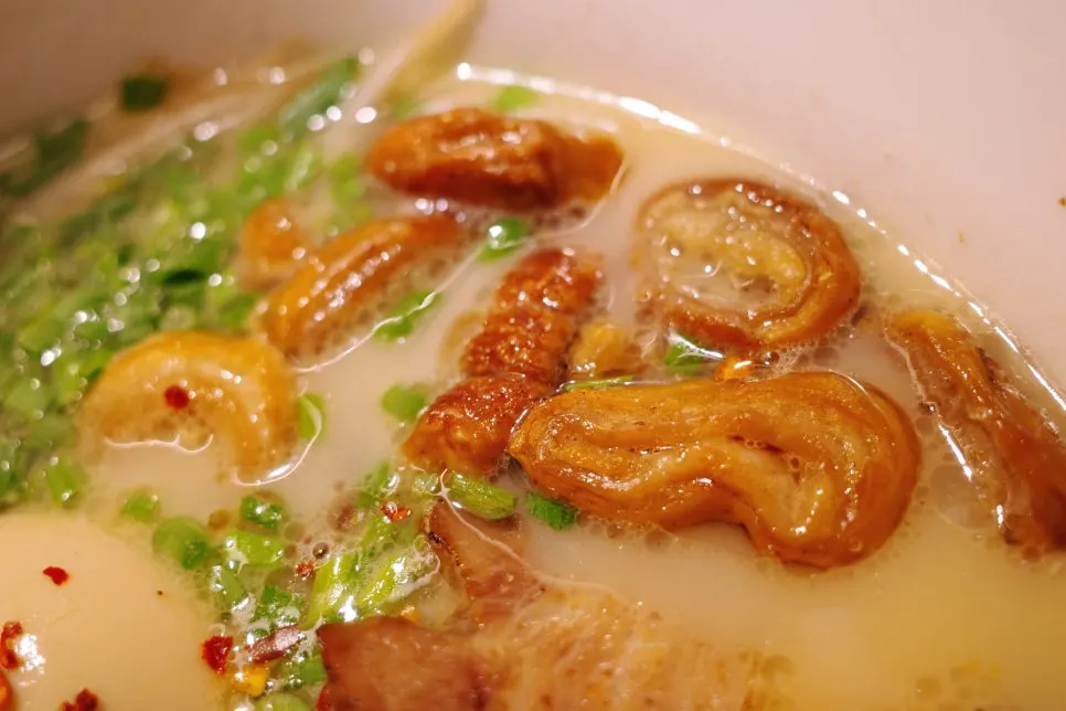 Rich ramen broth simmered from pork bones and chicken