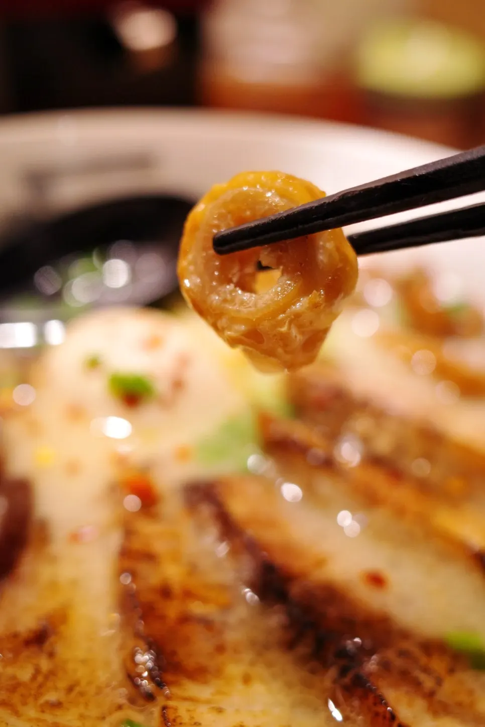 A spoonful of Gyedan Ramen Jinham broth