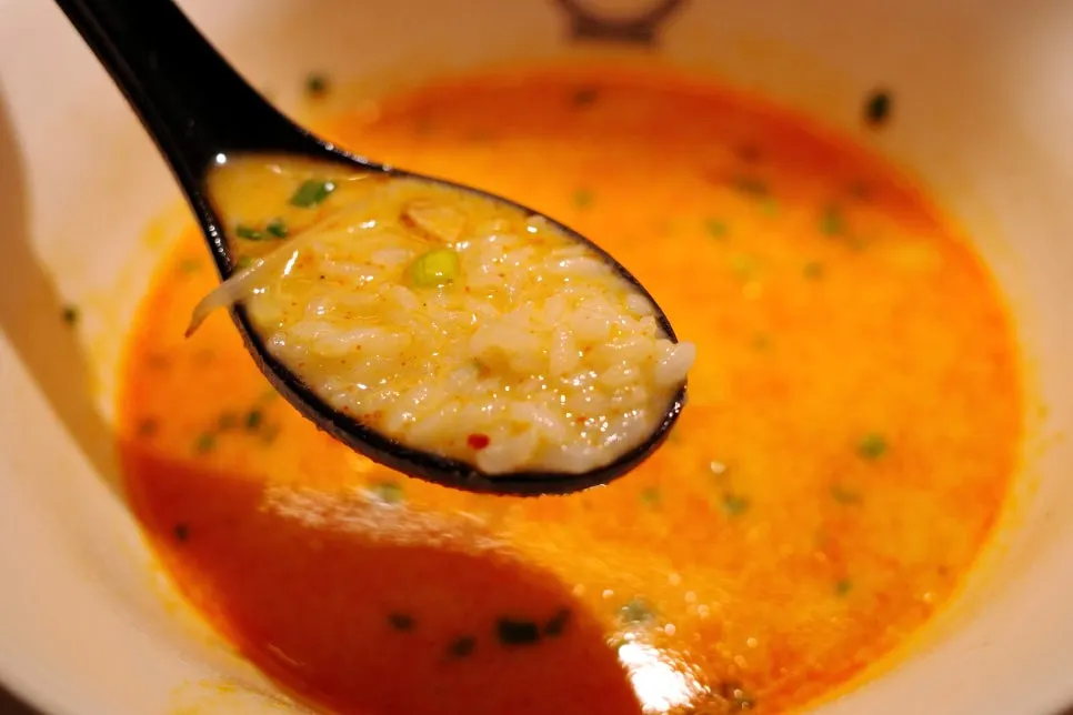 Broth turned into karai (spicy) ramen with added spicy sauce