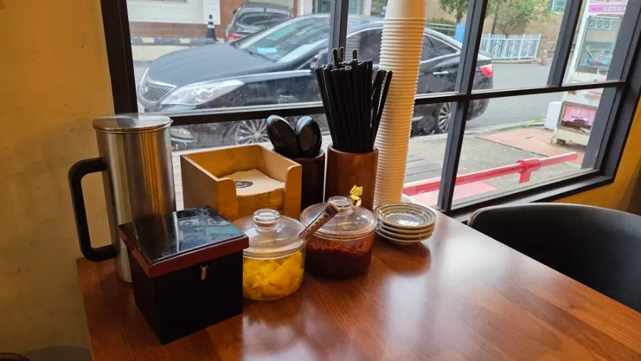Bar table and interior atmosphere at Gyedan Ramen