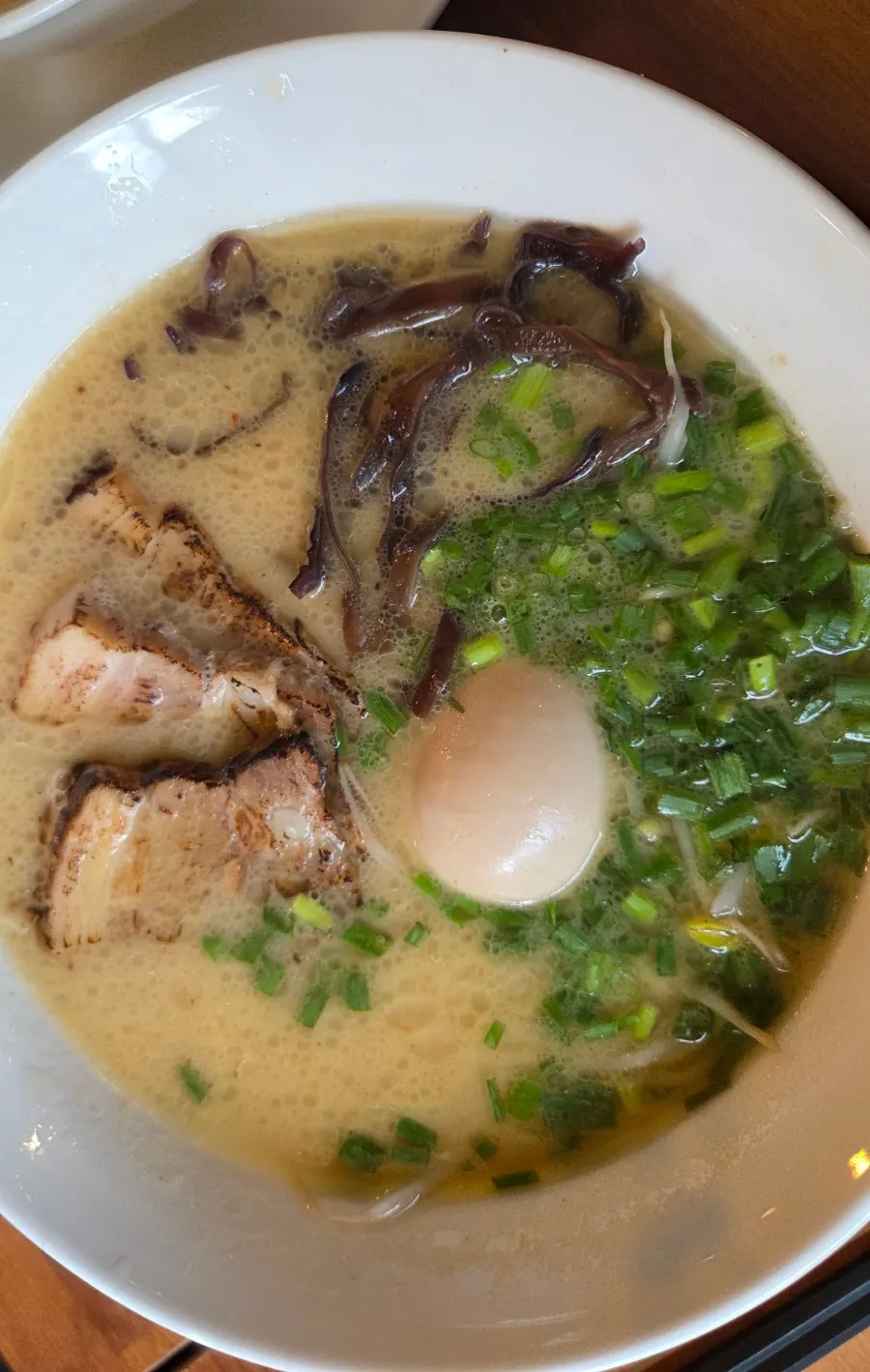 Gyedan Ramen topped with chashu, egg, and bean sprouts