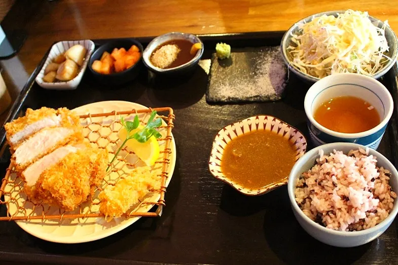 Table set with ordered cheese, sirloin, and tenderloin katsu