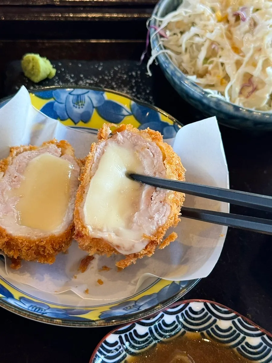 Cheese stretching from the cheese katsu