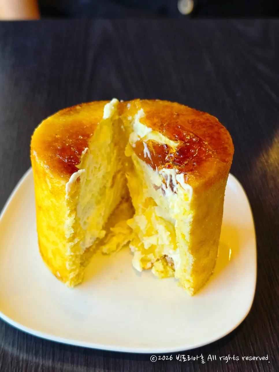 Baumkuchen with custard and apple filling