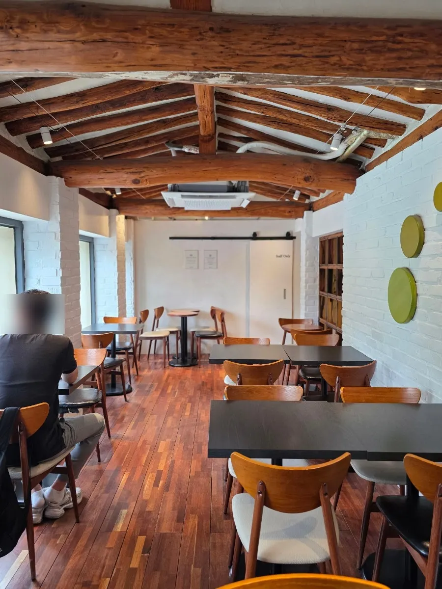 Second-floor space with a hanok-style ceiling