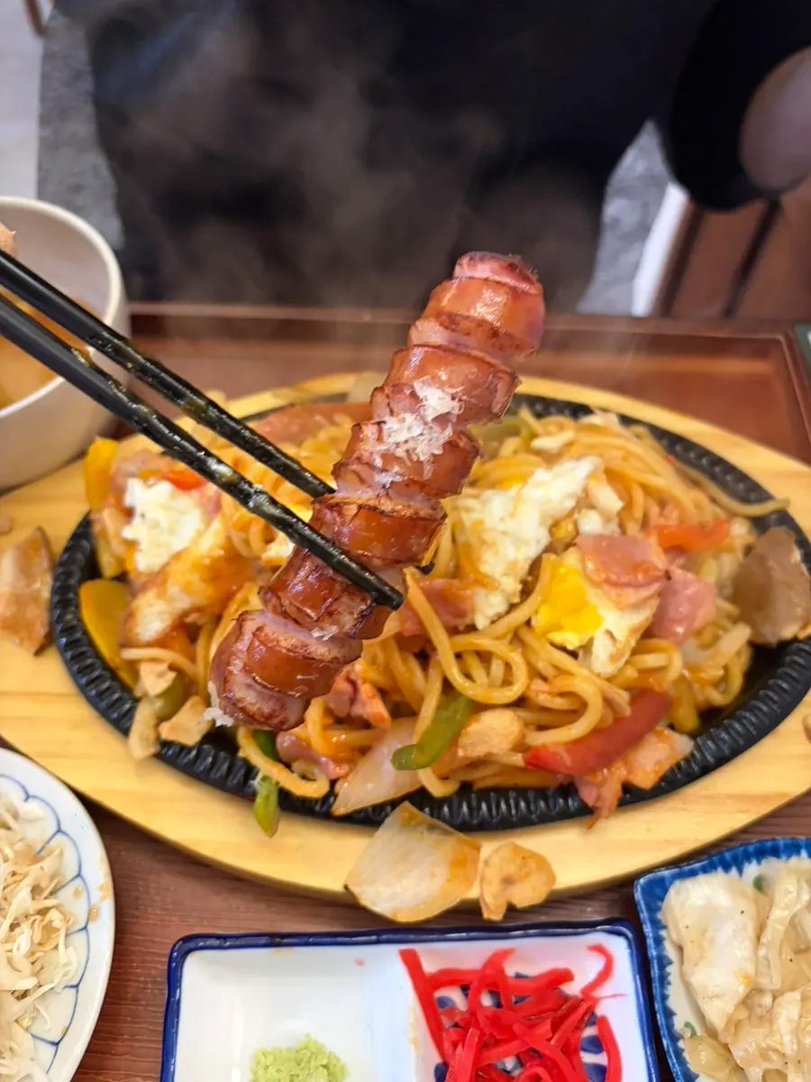 Close-up of sauce-coated Napolitan noodles