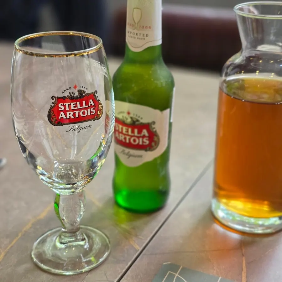 Stella beer ordered on the outdoor terrace